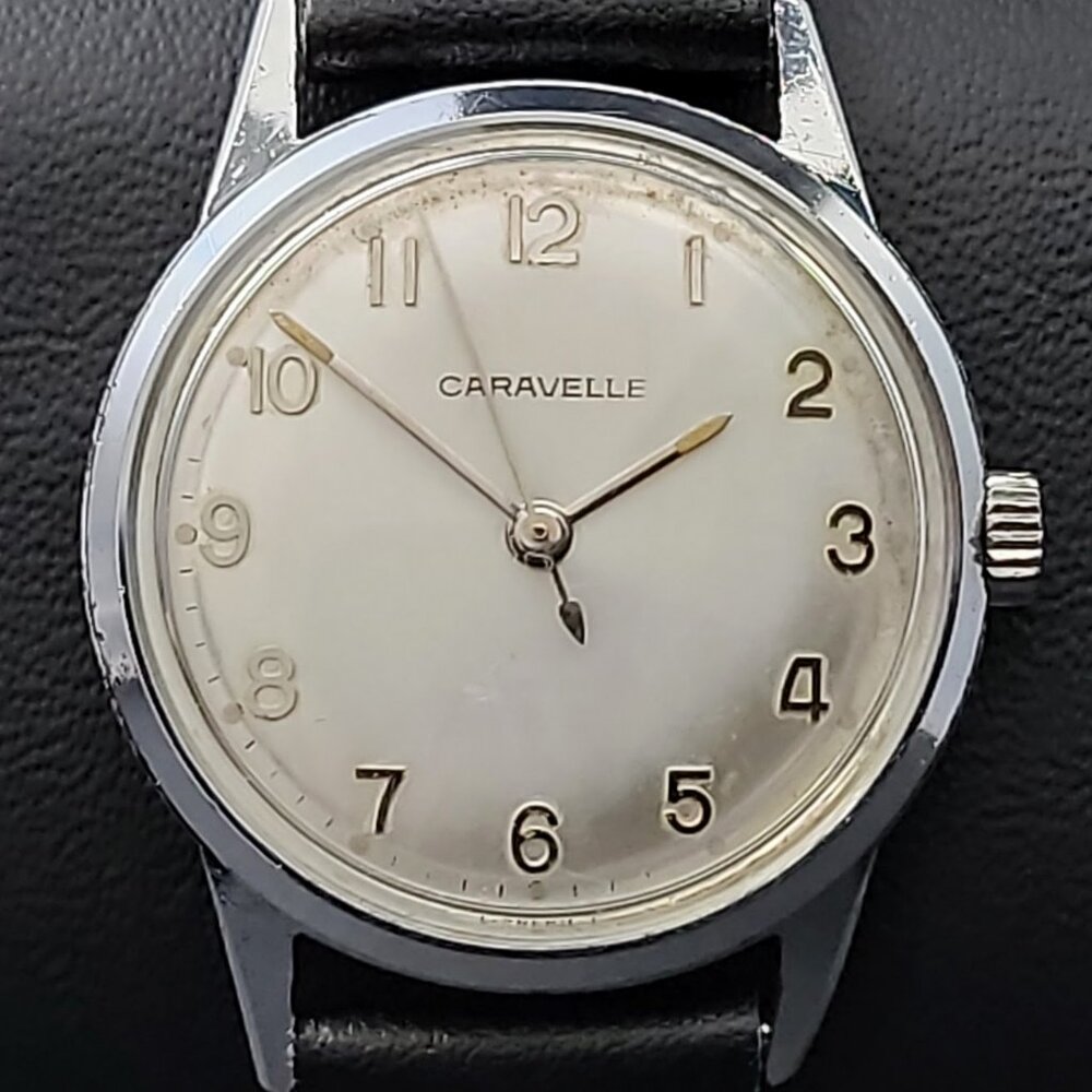 Vintage Caravelle Manual Wind Silver Dial Watch – Black Leather Strap